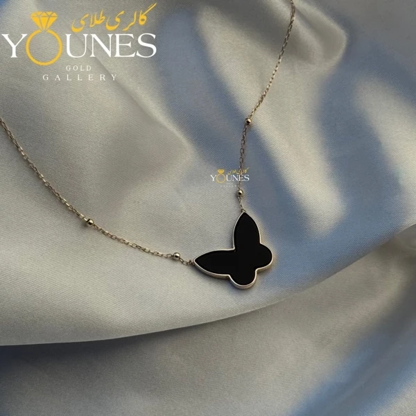 تصویر دوم گردنبند پروانه مشکی طلا